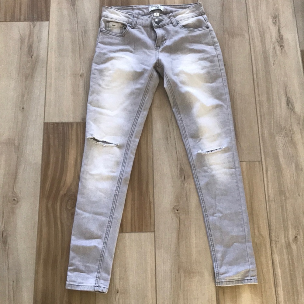 Grey slit knee denim jeans